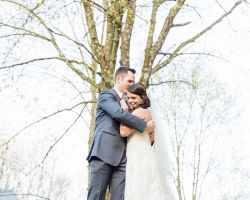 bride-groom-embrace-wedding-rustic-stairs-outdoor